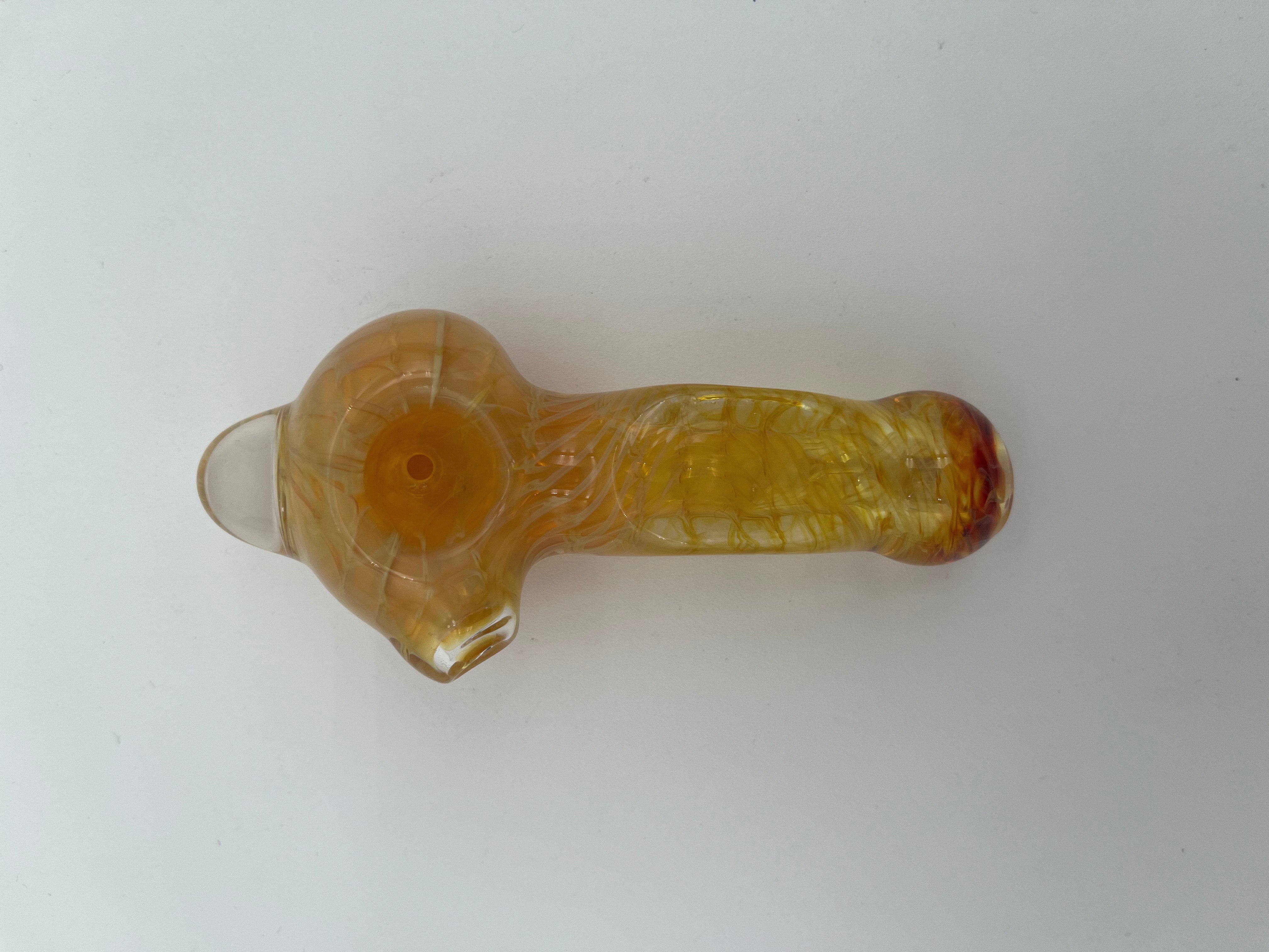 Yellow inside out spiral glass hand pipe made by Nelson Glassworks on a white background