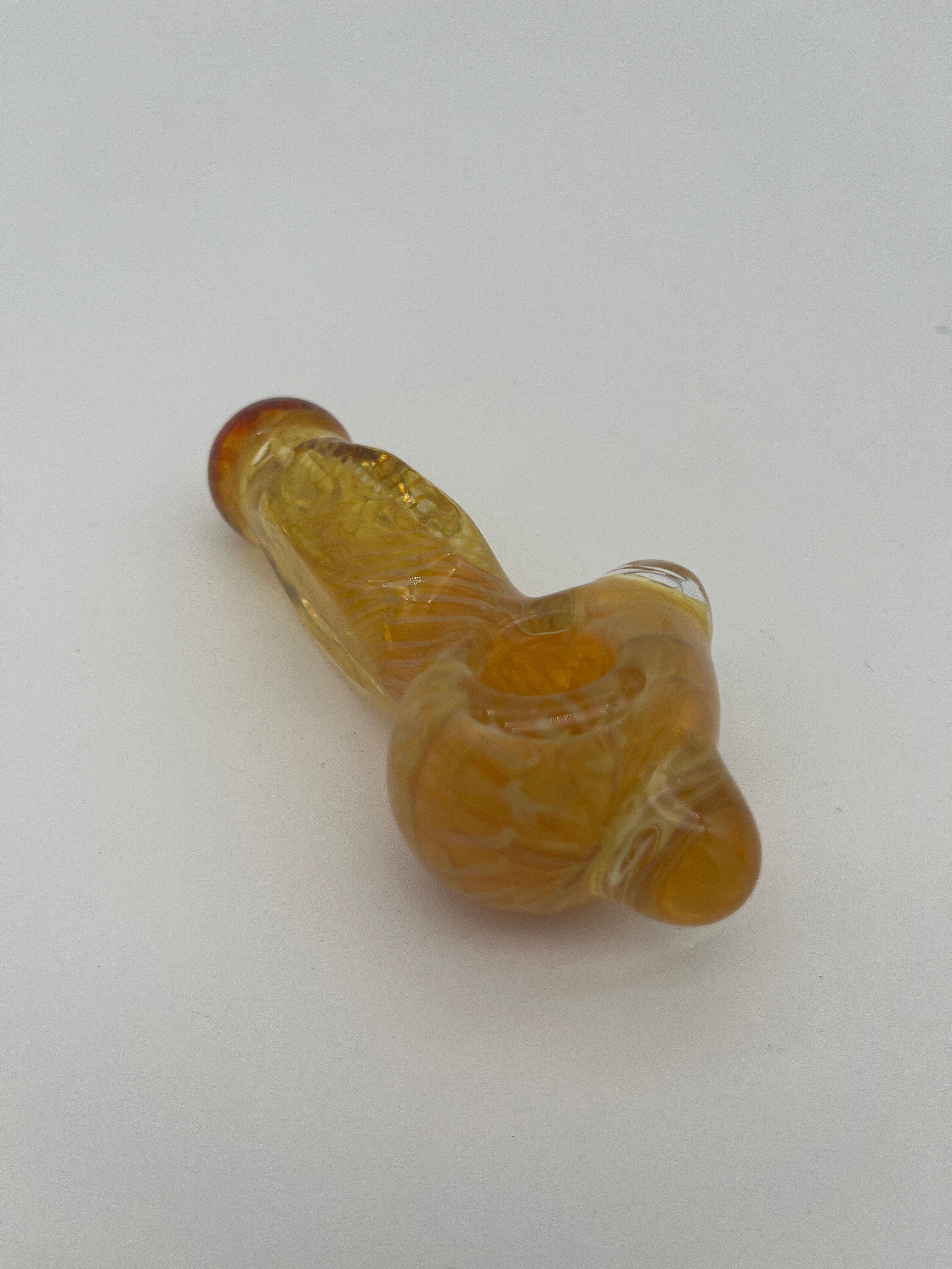 Yellow inside out spiral glass hand pipe made by Nelson Glassworks on a white background