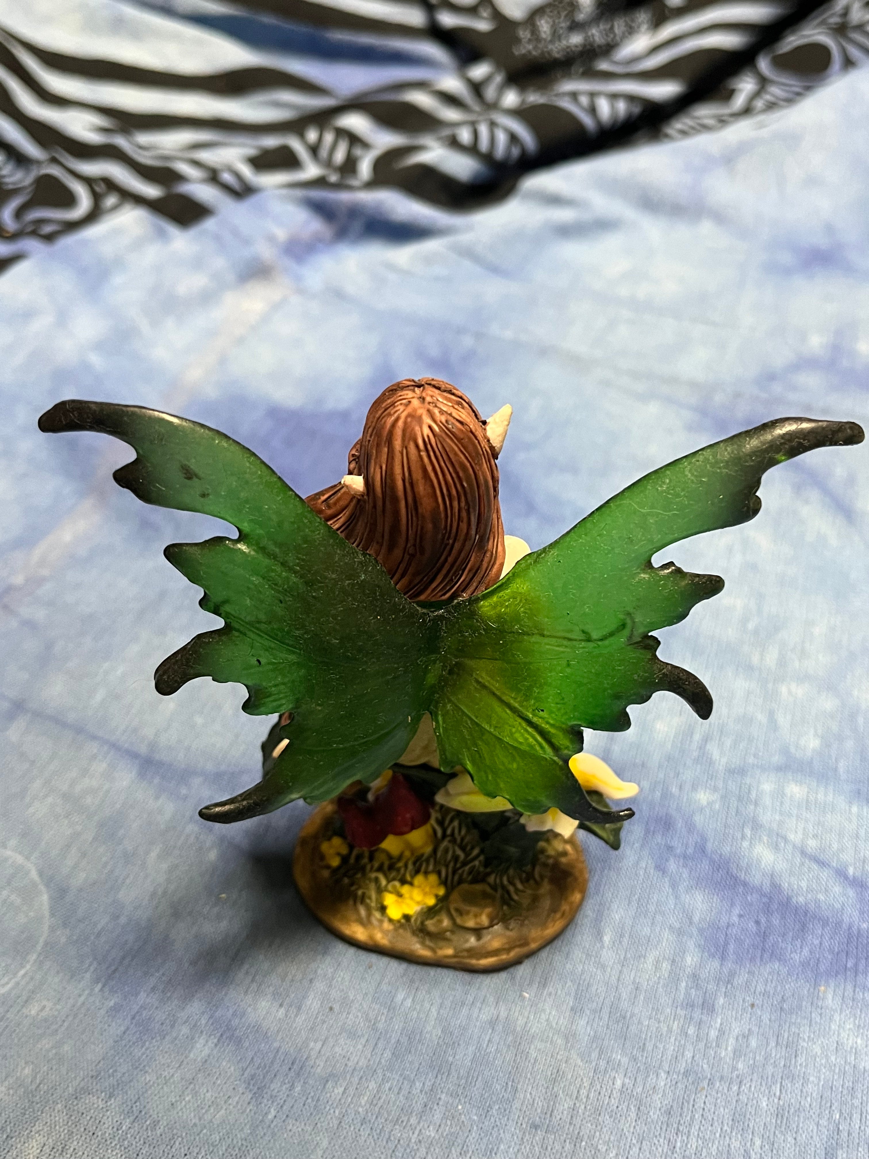 Whimsical Green-Winged Fairy Figurine